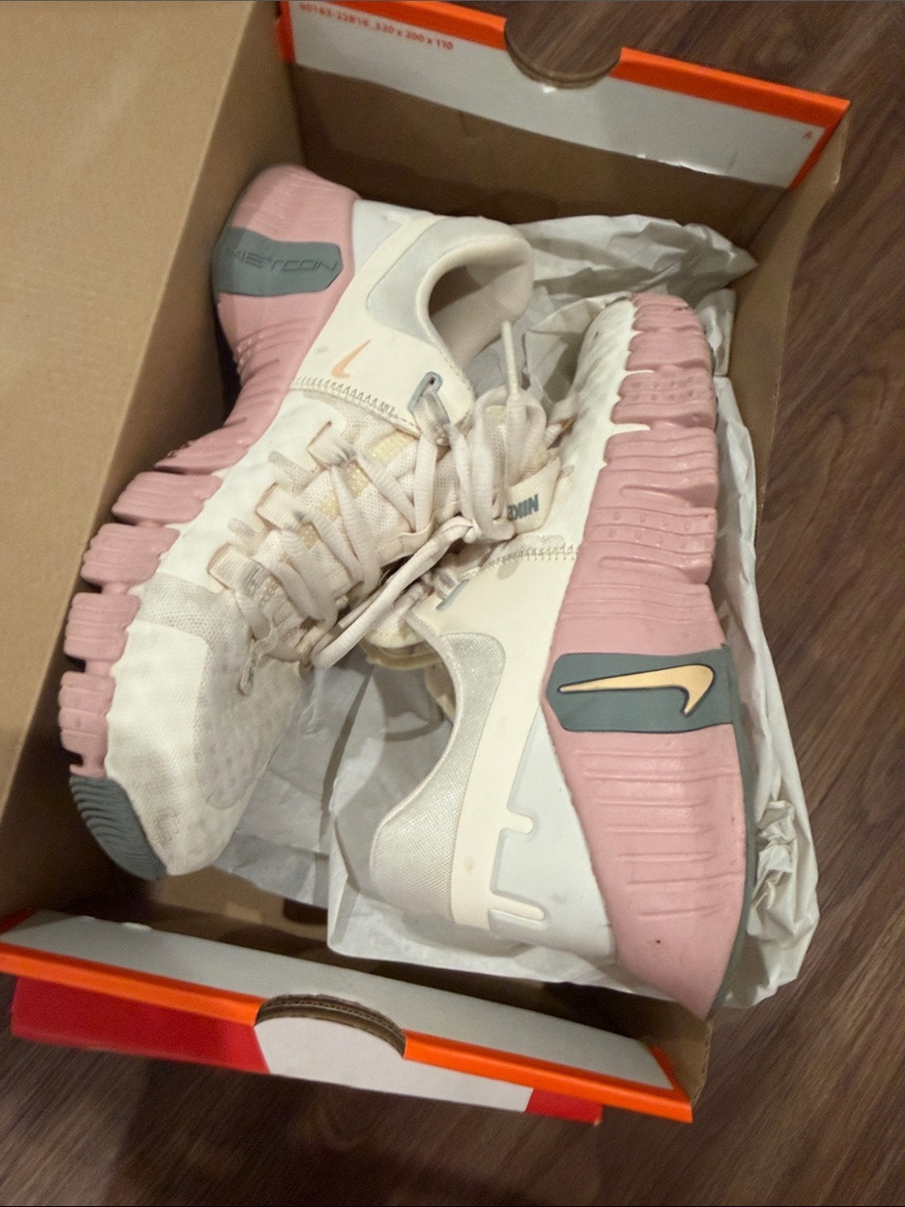 Nike Women’s White and Pink React-Style Sneakers
